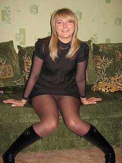 Hot amateur woman in pantyhose and high boots with no panties